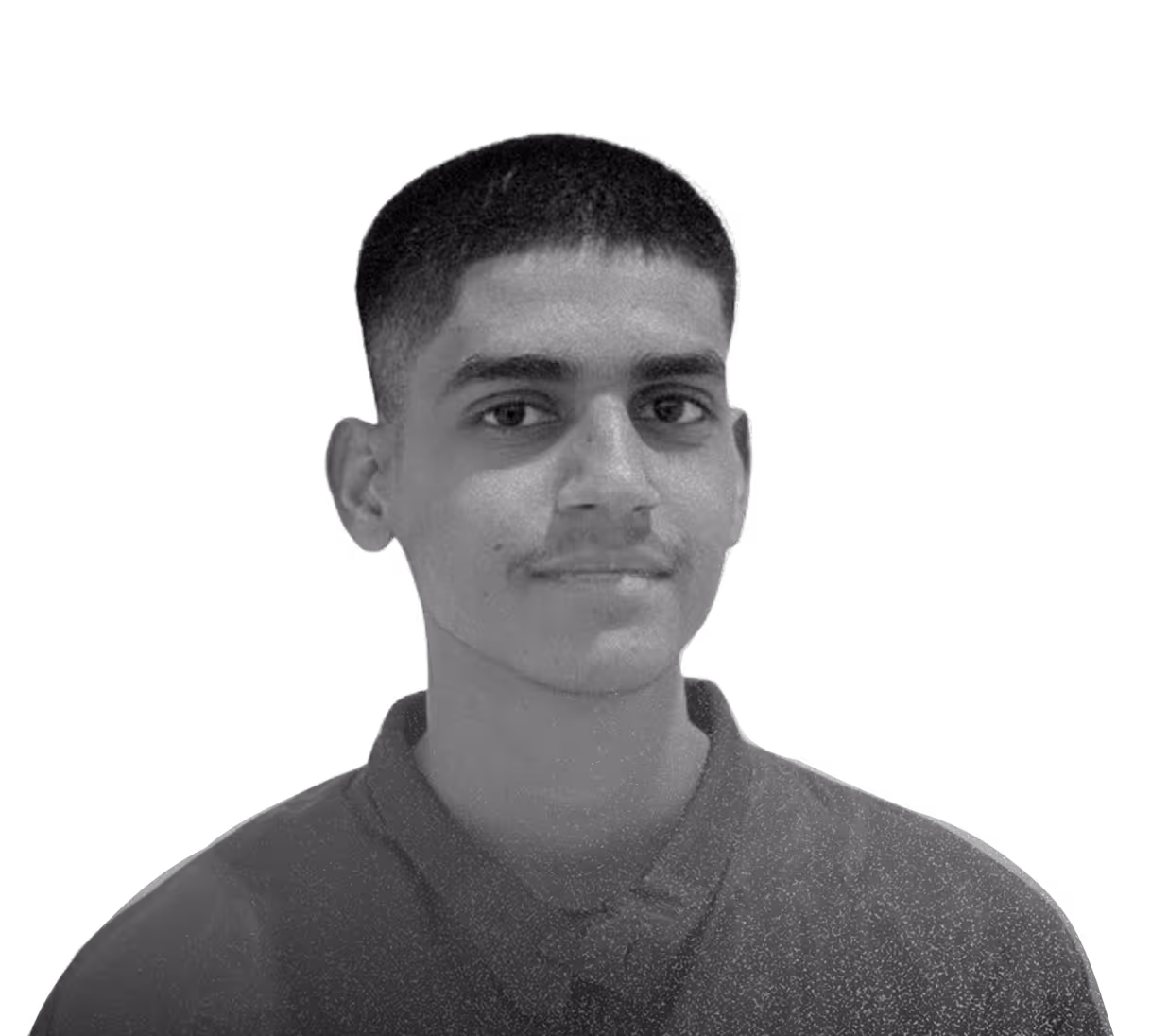 A black and white photo of a young man.